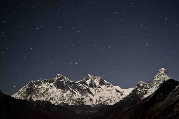 Star Parking From Himalayas at Night. Everest in the back, Nuptse in the centre, and Ama Dablam to the far right. Photographed from yeti Mountain Home, Kongde, at 4,250 metres. Kashish Das Shrestha, November 2011.