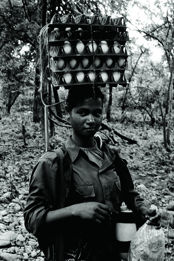 A Maoist soldier transports eggs to a nearby camp in Gadchiroli, 2010. Eggs are a luxury item. 