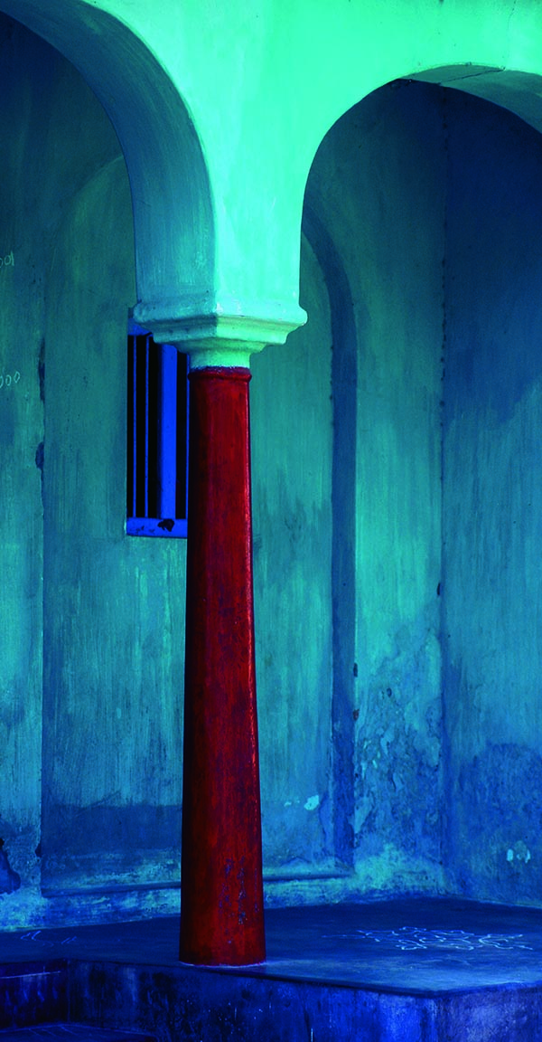 Red Pillar and blue wall.